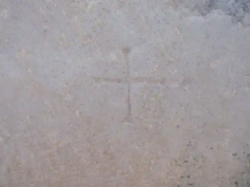 Cross without circle or frame engraved on a marble stone, located in the ruins of Curetes Street, Ephesus Izmir